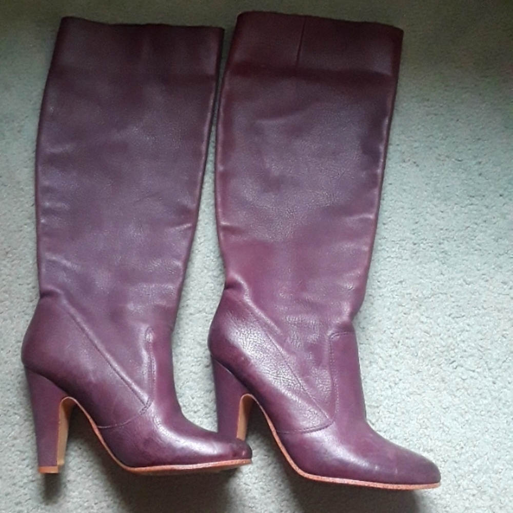 These are a rich lavender purple leather boot from Aldo
